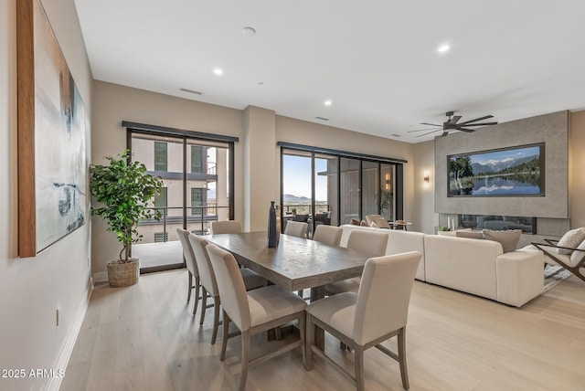 dining room with light wood-type flooring, visible vents, recessed lighting, baseboards, and ceiling fan