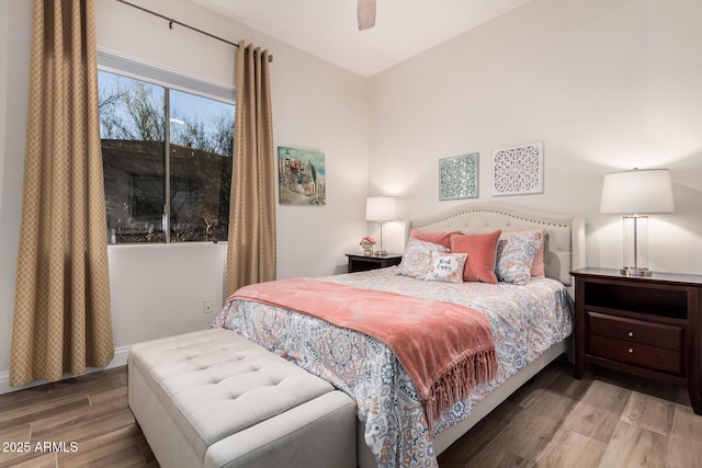 bedroom featuring ceiling fan and wood finished floors