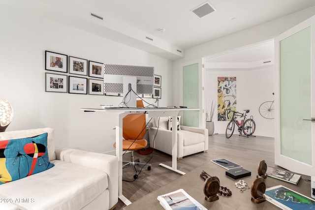 home office featuring hardwood / wood-style floors