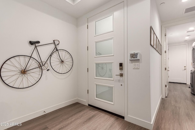 foyer entrance featuring light hardwood / wood-style floors