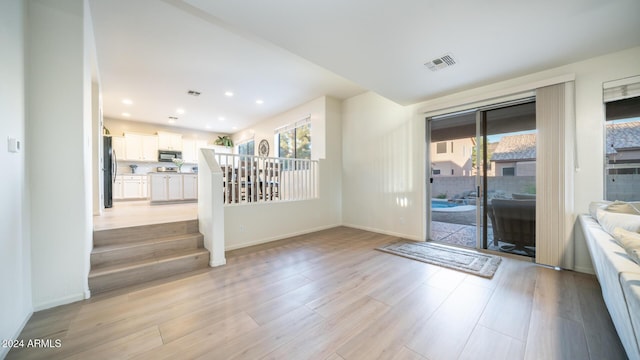 doorway to outside featuring light hardwood / wood-style floors