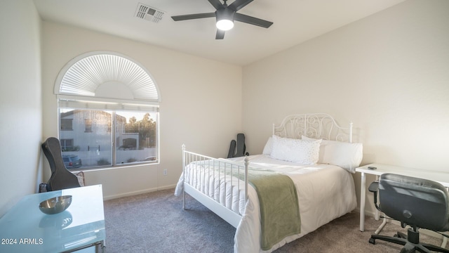 carpeted bedroom with ceiling fan