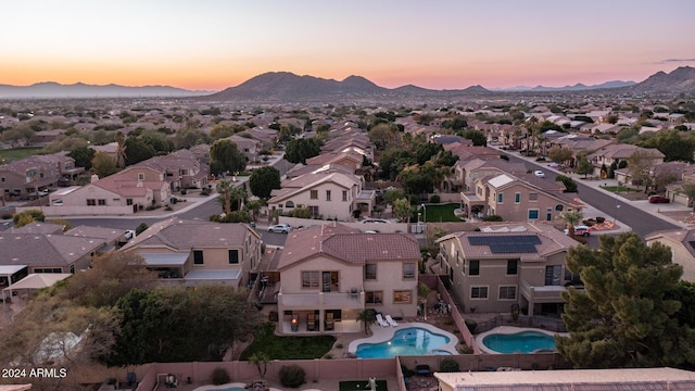 aerial view at dusk with a mountain view