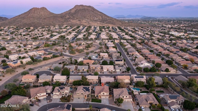 aerial view at dusk with a mountain view