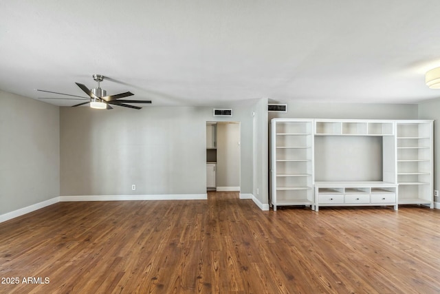 unfurnished living room with visible vents, baseboards, wood finished floors, and a ceiling fan