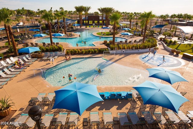 view of swimming pool featuring a patio area