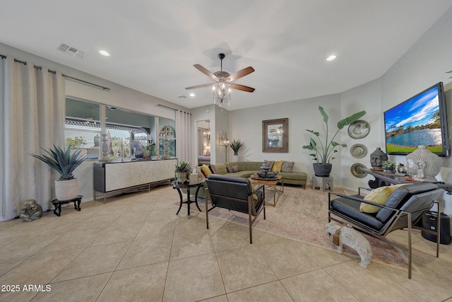 living room with recessed lighting, visible vents, ceiling fan, and light tile patterned floors