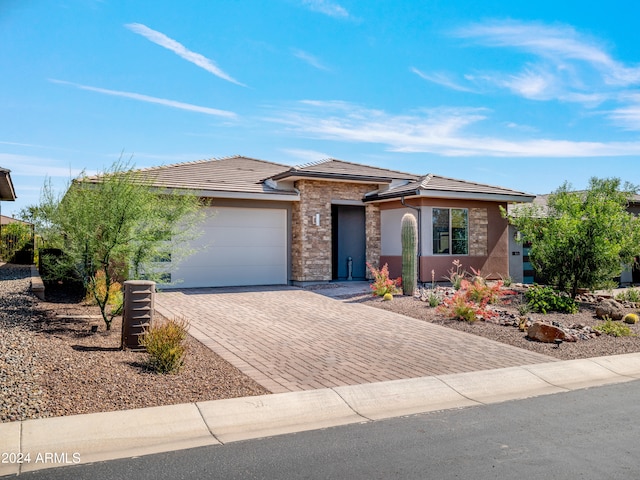 view of front of home featuring a garage