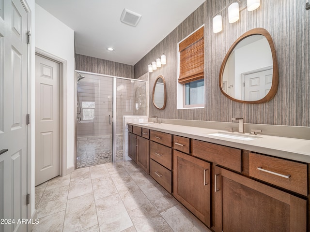 bathroom featuring vanity and walk in shower