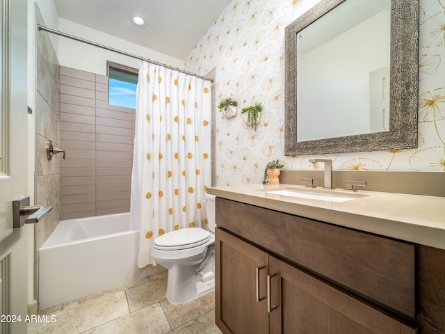 full bathroom featuring tile patterned flooring, vanity, toilet, and shower / bathtub combination with curtain