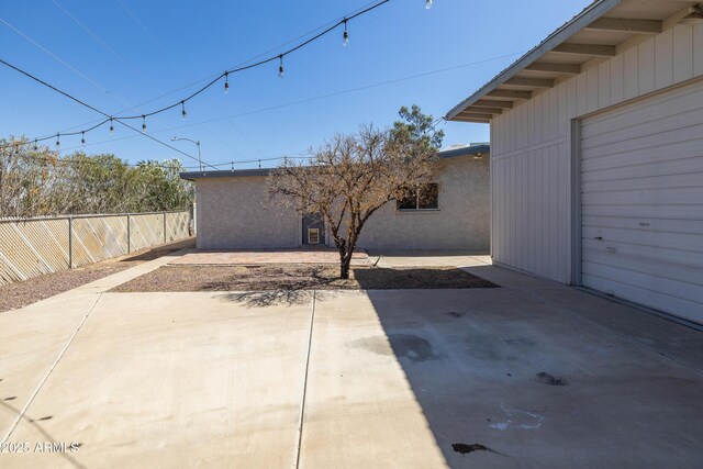 2346 E Sylvia St, Phoenix, AZ 85022 - view of patio with fence and a garage