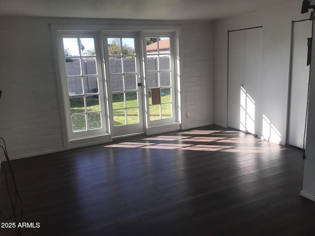 interior space with dark hardwood / wood-style floors