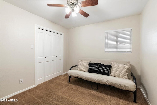 sitting room featuring carpet floors and ceiling fan