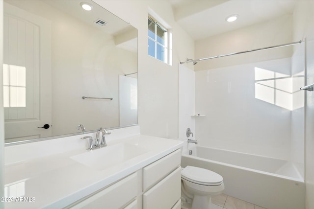 full bathroom featuring tile patterned flooring, vanity, shower / bath combination, and toilet