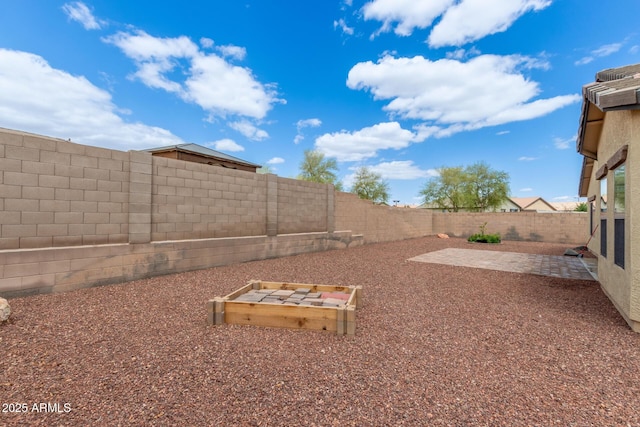 25212 W Maldonado Dr, Buckeye, AZ 85326 - view of yard featuring a fenced backyard and a patio