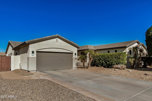 ranch-style house featuring a garage