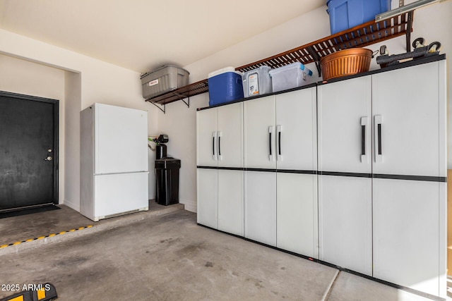 garage with white refrigerator