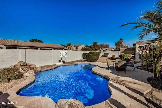 view of pool featuring a patio area