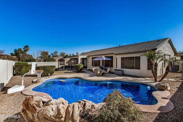 view of pool featuring a patio