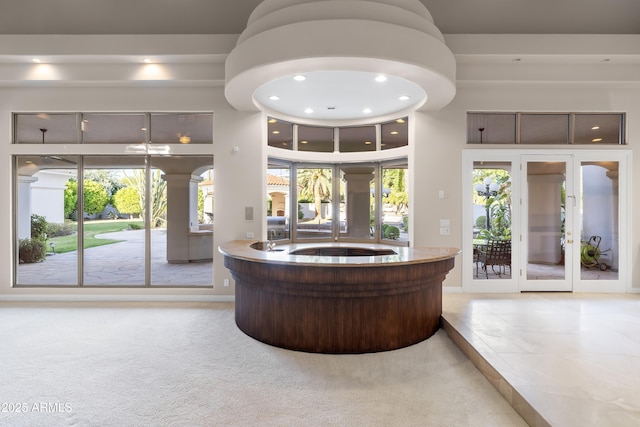 reception area featuring french doors and recessed lighting