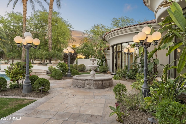 view of community with a patio area