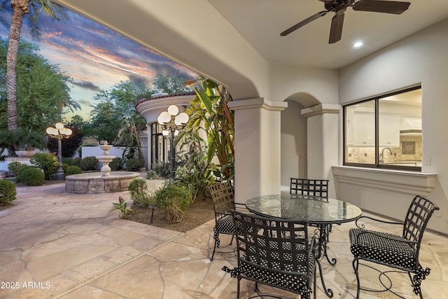 view of patio / terrace featuring ceiling fan and outdoor dining area