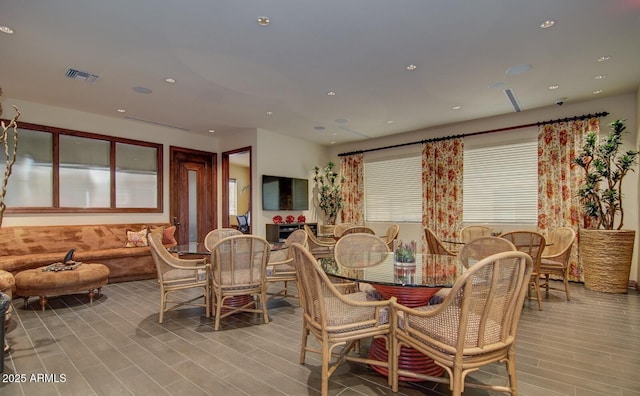 6900 E Princess Dr Unit 1176, Phoenix, AZ 85054 - dining space featuring plenty of natural light, light wood-style flooring, and recessed lighting