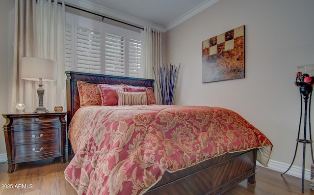 6900 E Princess Dr Unit 1176, Phoenix, AZ 85054 - bedroom featuring crown molding, wood finished floors, and baseboards