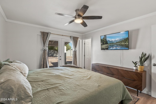 bedroom with hardwood / wood-style flooring, ceiling fan, access to outside, french doors, and crown molding