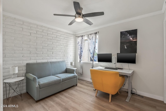 home office with ceiling fan, ornamental molding, and light hardwood / wood-style floors