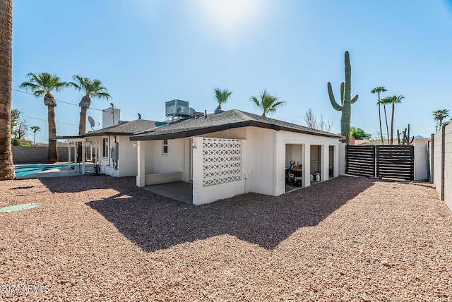 rear view of house featuring a patio