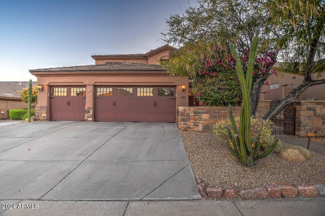 view of front of house with a garage