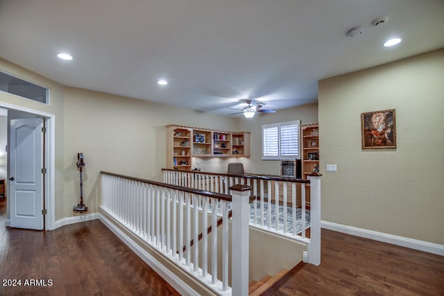 hallway featuring dark hardwood / wood-style floors