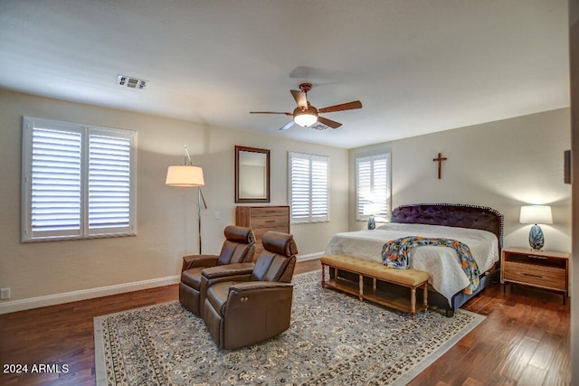 bedroom featuring dark hardwood / wood-style floors and ceiling fan