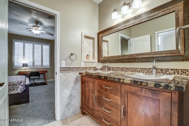 bathroom featuring vanity and ceiling fan