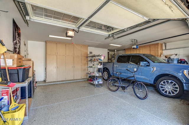 garage featuring a garage door opener