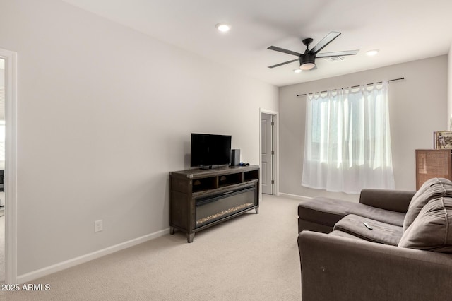 living room with light carpet, baseboards, and recessed lighting