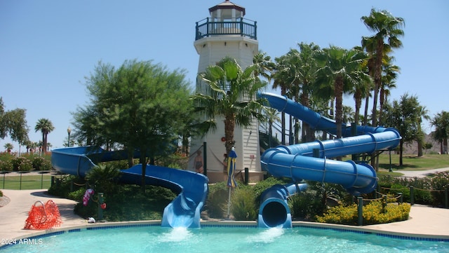 view of pool featuring a water slide