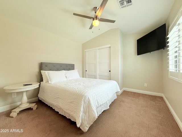 218 N Palm St, Gilbert, AZ 85234 - bedroom with carpet, a closet, baseboards, a ceiling fan, and vaulted ceiling