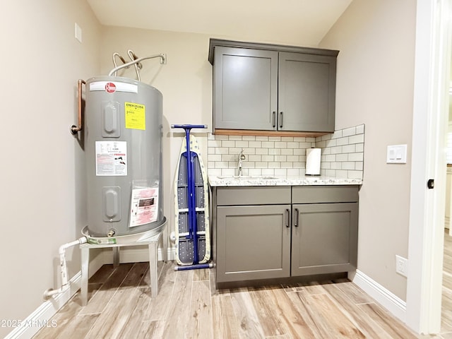 218 N Palm St, Gilbert, AZ 85234 - utility room featuring a sink and electric water heater