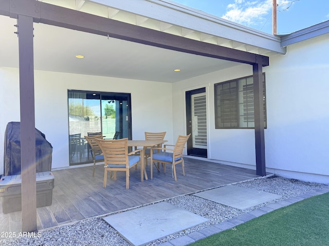 218 N Palm St, Gilbert, AZ 85234 - wooden deck featuring outdoor dining area