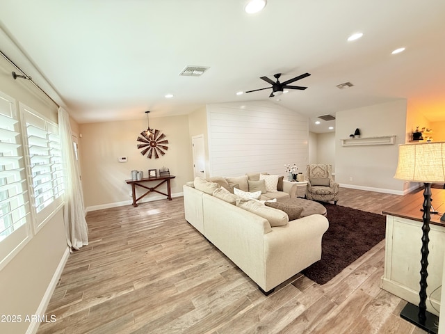218 N Palm St, Gilbert, AZ 85234 - living area with light wood-style floors, a ceiling fan, vaulted ceiling, baseboards, and recessed lighting