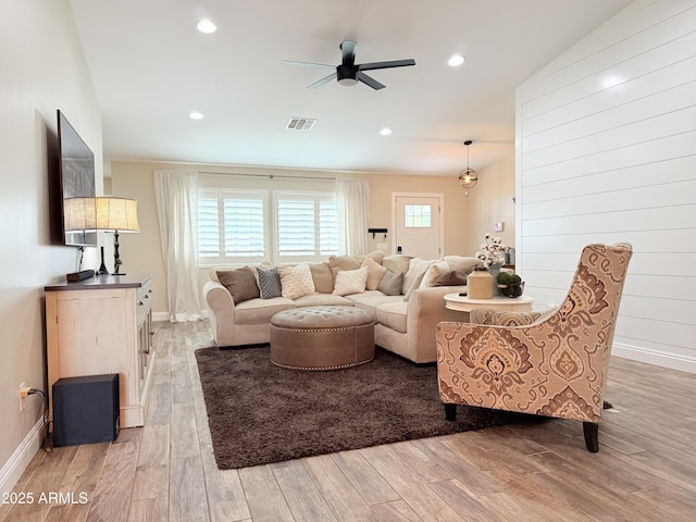 218 N Palm St, Gilbert, AZ 85234 - living room featuring light wood-style floors, ceiling fan, plenty of natural light, baseboards, and recessed lighting