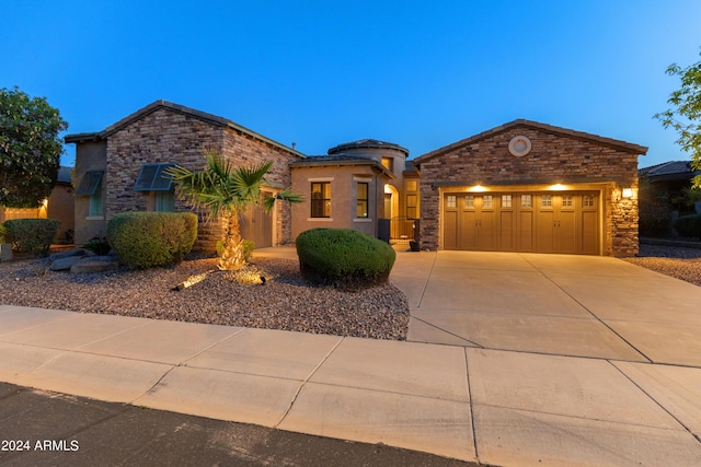 view of front of home with a garage