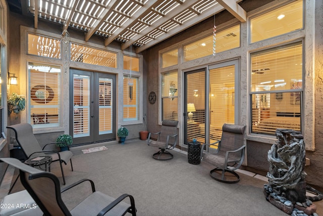 view of patio featuring french doors and a pergola