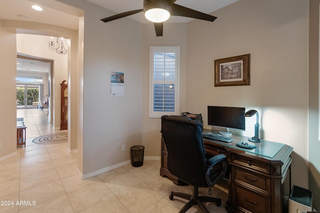 office with light tile patterned floors and ceiling fan