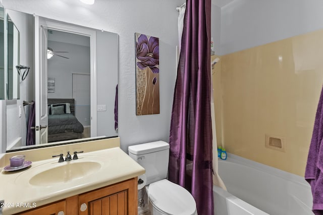 full bathroom featuring toilet, ceiling fan, vanity, and shower / bathtub combination with curtain