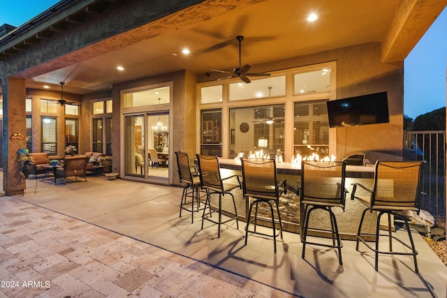 view of patio / terrace featuring ceiling fan