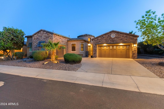 view of front of house with a garage