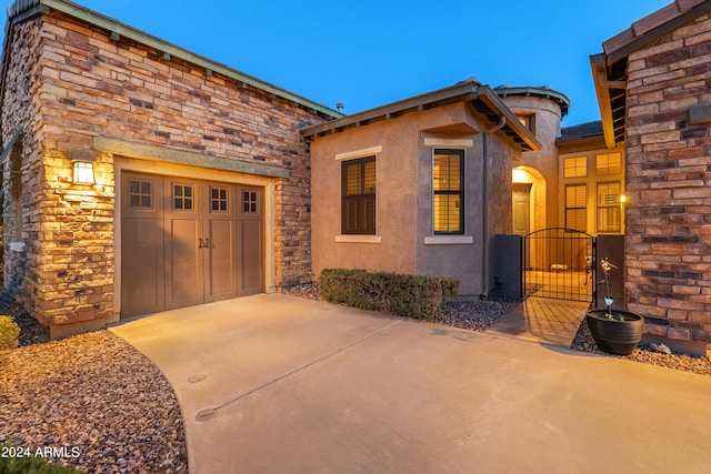 view of front of home with a garage